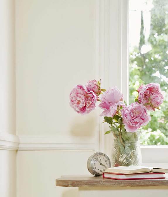 Nightstand With Clock And Flowers (1)